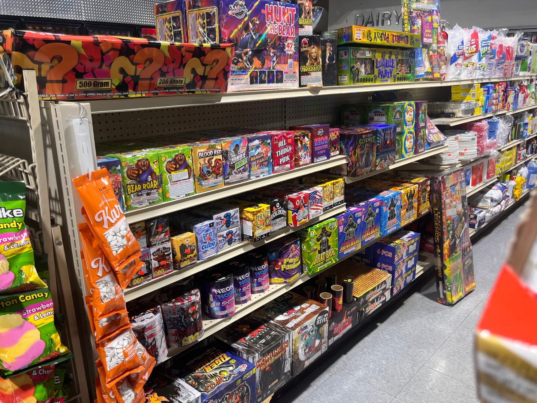Aisle of fireworks at Scotia Stop with assortments and novelties